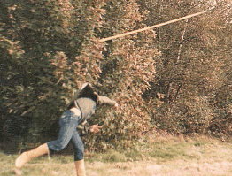 Picture of someone throwing a metal
sighting pole